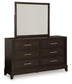 Neymorton Queen Upholstered Panel Bed with Mirrored Dresser