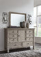 Harrastone Queen Panel Bed with Mirrored Dresser, Chest and Nightstand